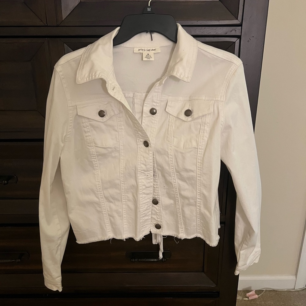 White jean jacket with ties in the back
